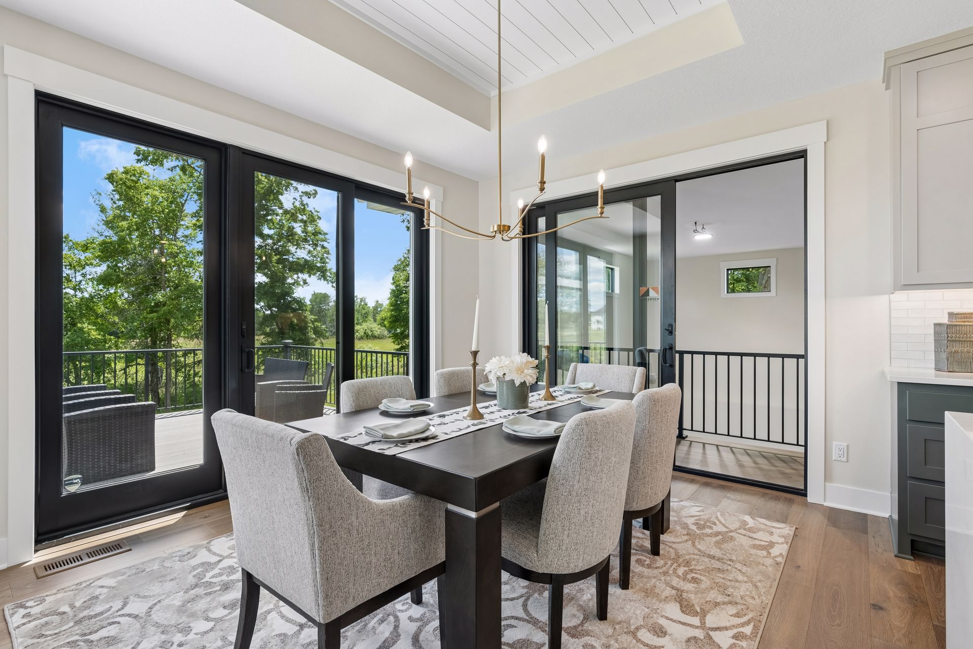 Dining area with scenic views and access to covered outdoor living space